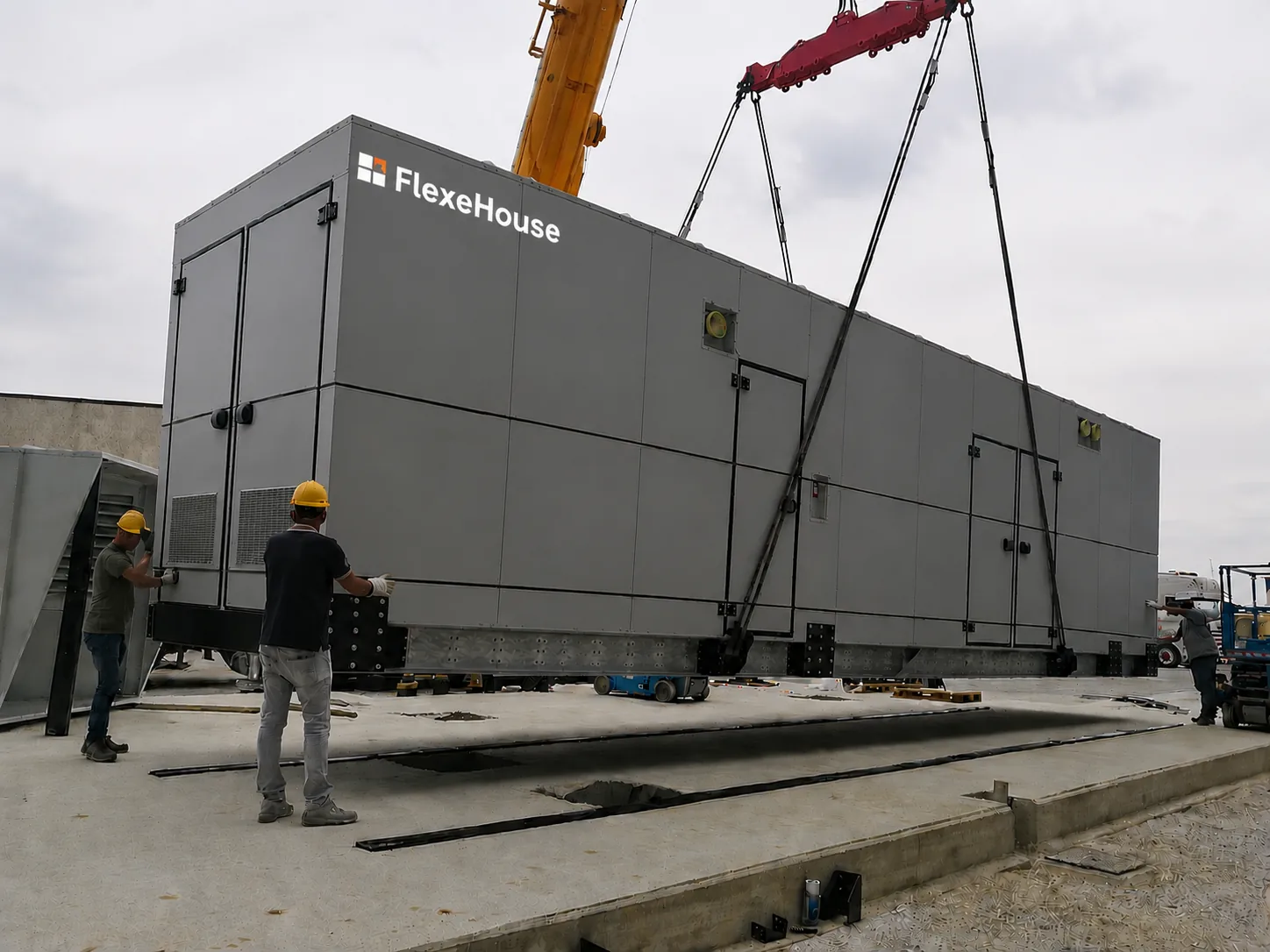 FlexEhouse craned into position — engineered for single-lift installation.